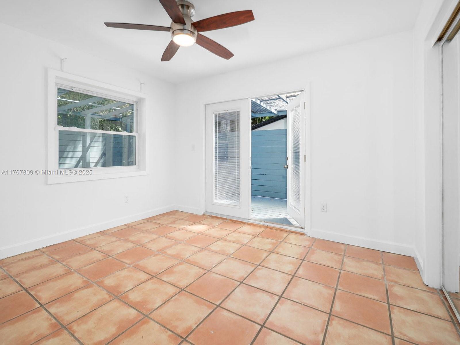 3631 Loquat Avenue Miami, FL 33133 - Photo 20 of 31 a view of an empty room with a window