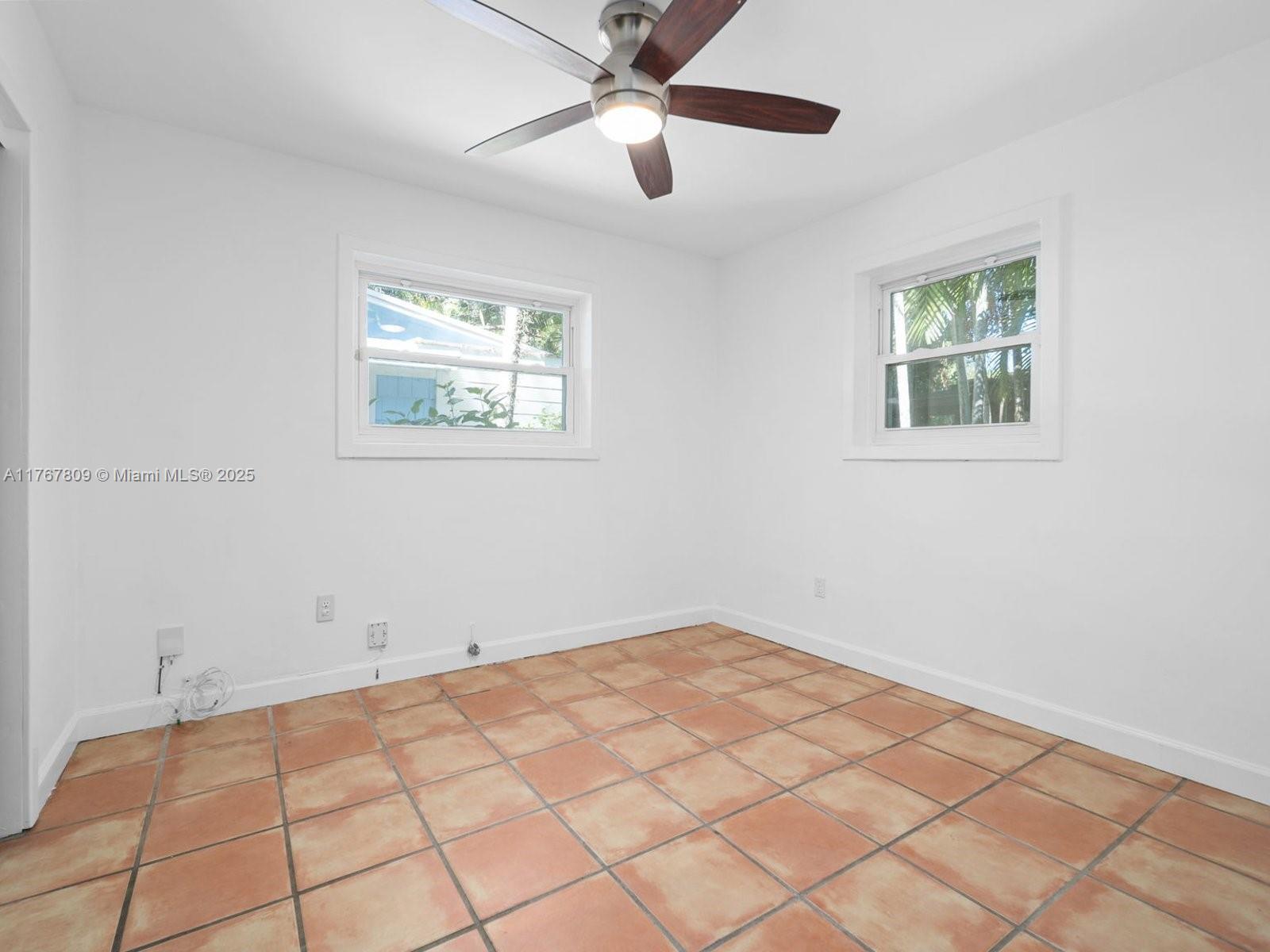3631 Loquat Avenue Miami, FL 33133 - Photo 23 of 31 a view of an empty room with a window