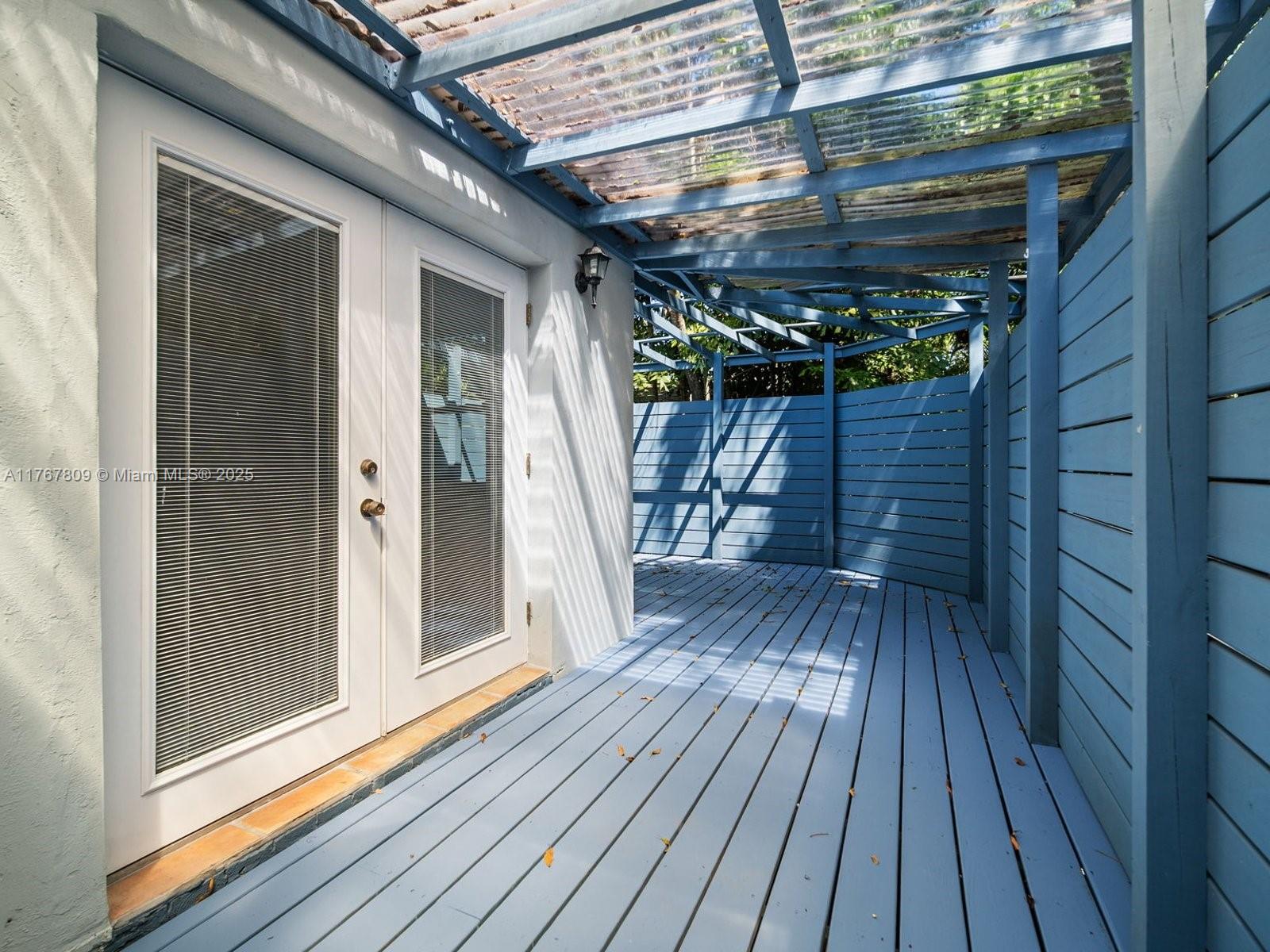 3631 Loquat Avenue Miami, FL 33133 - Photo 24 of 31 a view of outdoor space with wooden floor