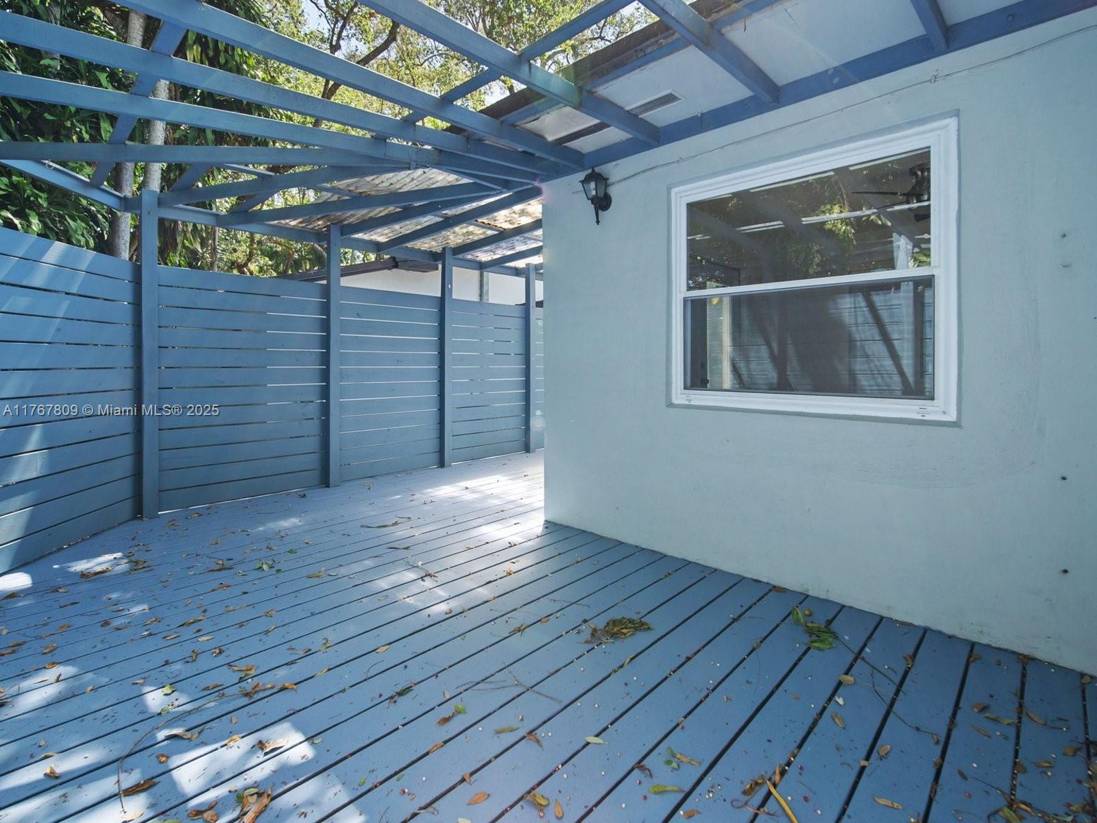 3631 Loquat Avenue Miami, FL 33133 - Photo 25 of 31 a view of an empty room with wooden floor