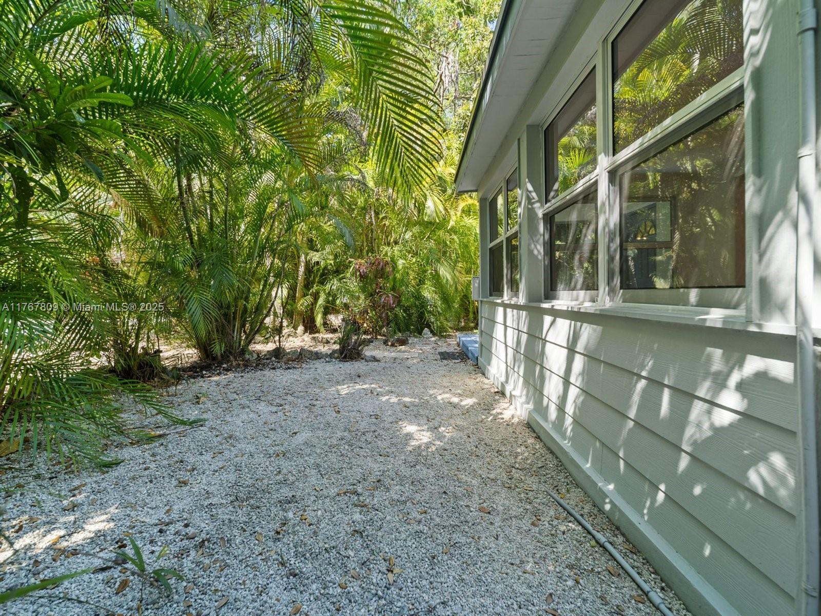 3631 Loquat Avenue Miami, FL 33133 - Photo 28 of 31 a view of outdoor space and yard