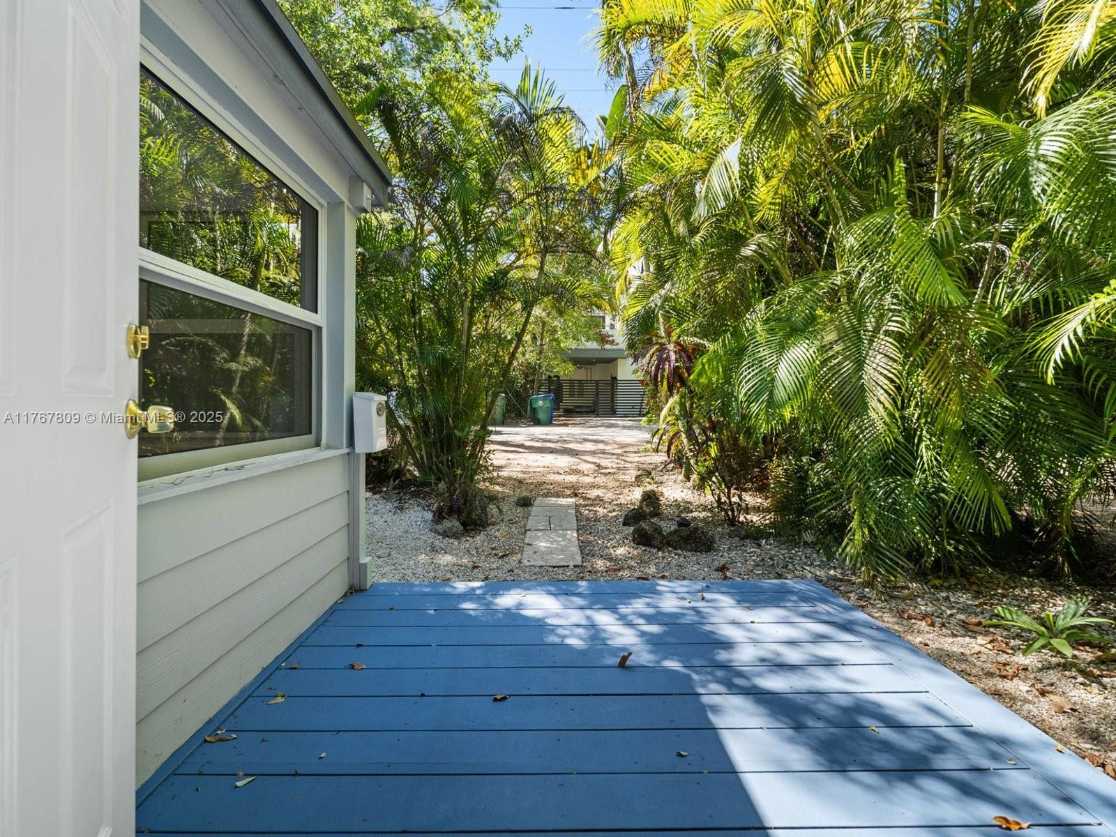 3631 Loquat Avenue Miami, FL 33133 - Photo 4 of 31 a view of a house with a yard