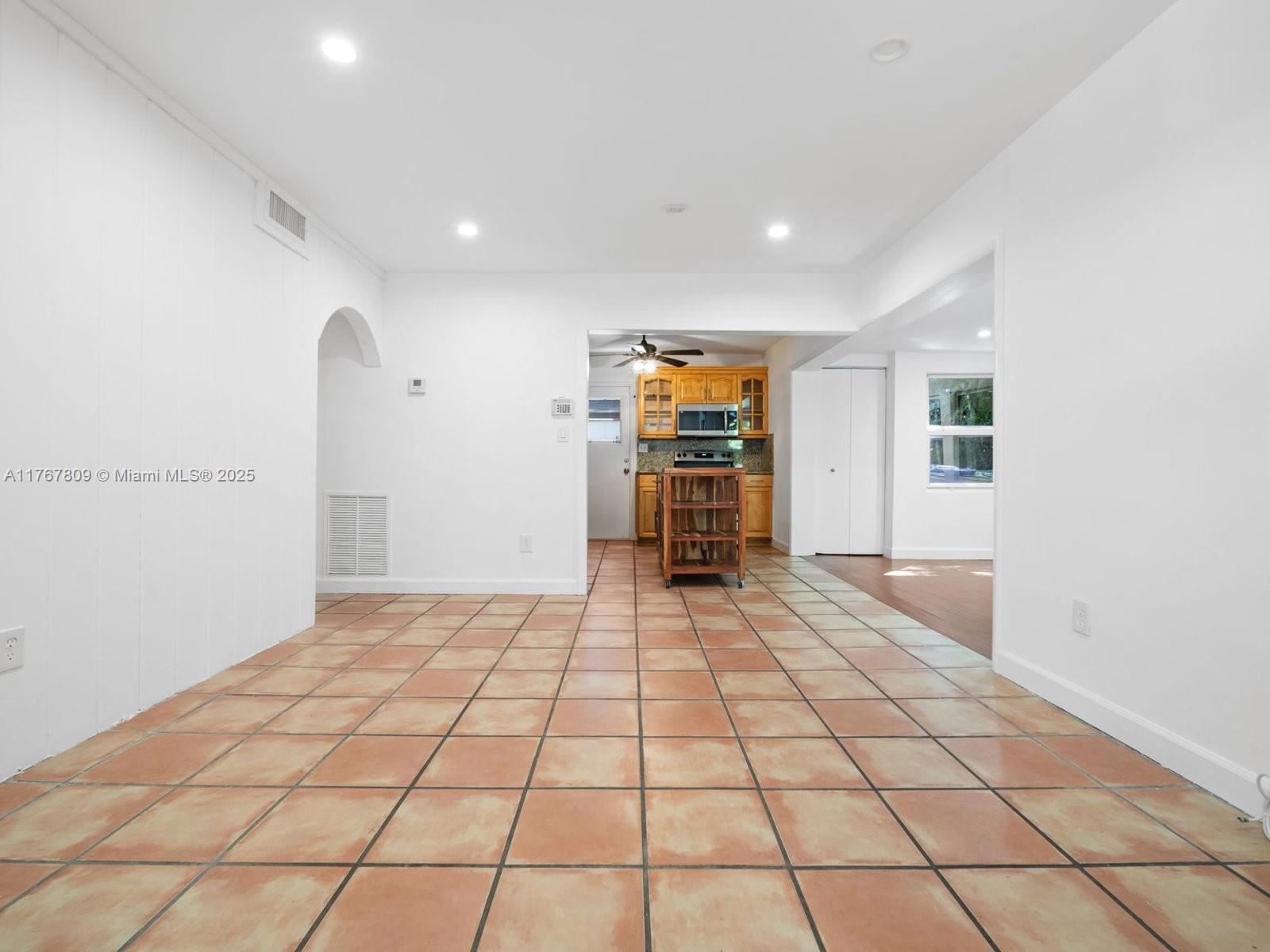 3631 Loquat Avenue Miami, FL 33133 - Photo 5 of 31 a view of empty room