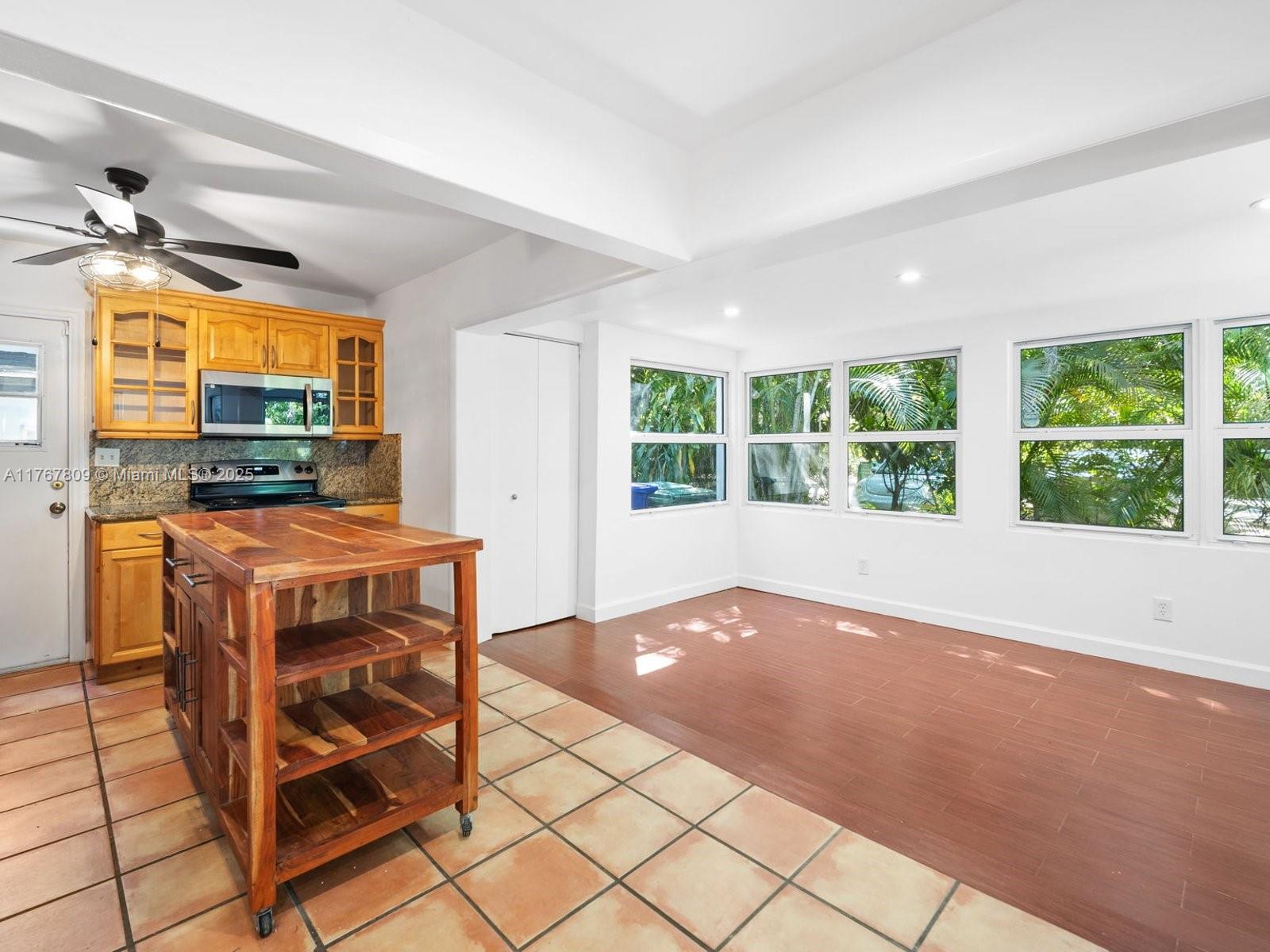 3631 Loquat Avenue Miami, FL 33133 - Photo 8 of 31 a view of room with window and outdoor view