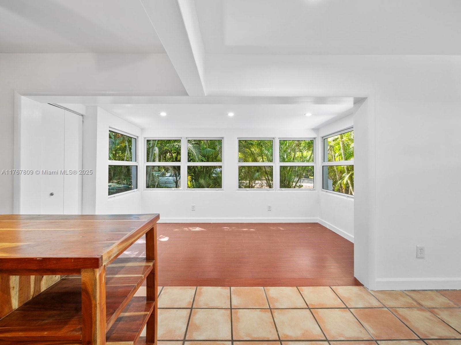 3631 Loquat Avenue Miami, FL 33133 - Photo 9 of 31 a view of an empty room with a window