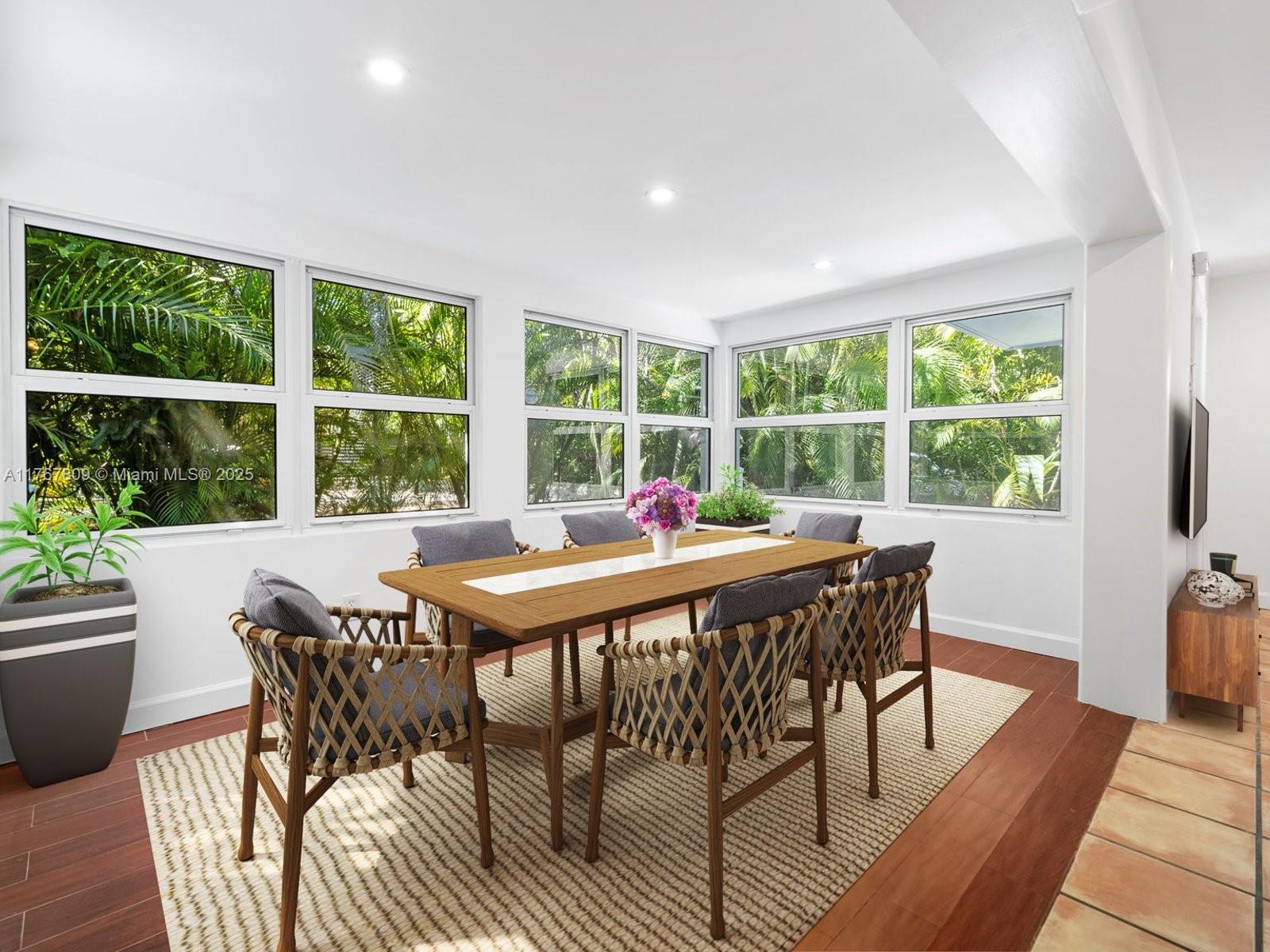3631 Loquat Avenue Miami, FL 33133 - Photo 10 of 31 a view of a dining room with furniture window and outside view