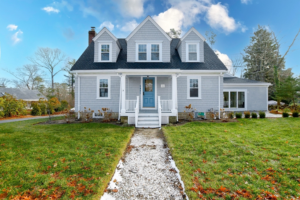 3 Pleasant Street Marion, MA 02738 - Photo 3 of 14 a front view of house with yard and green space