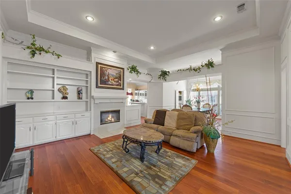 a view of backyard of house with green space
