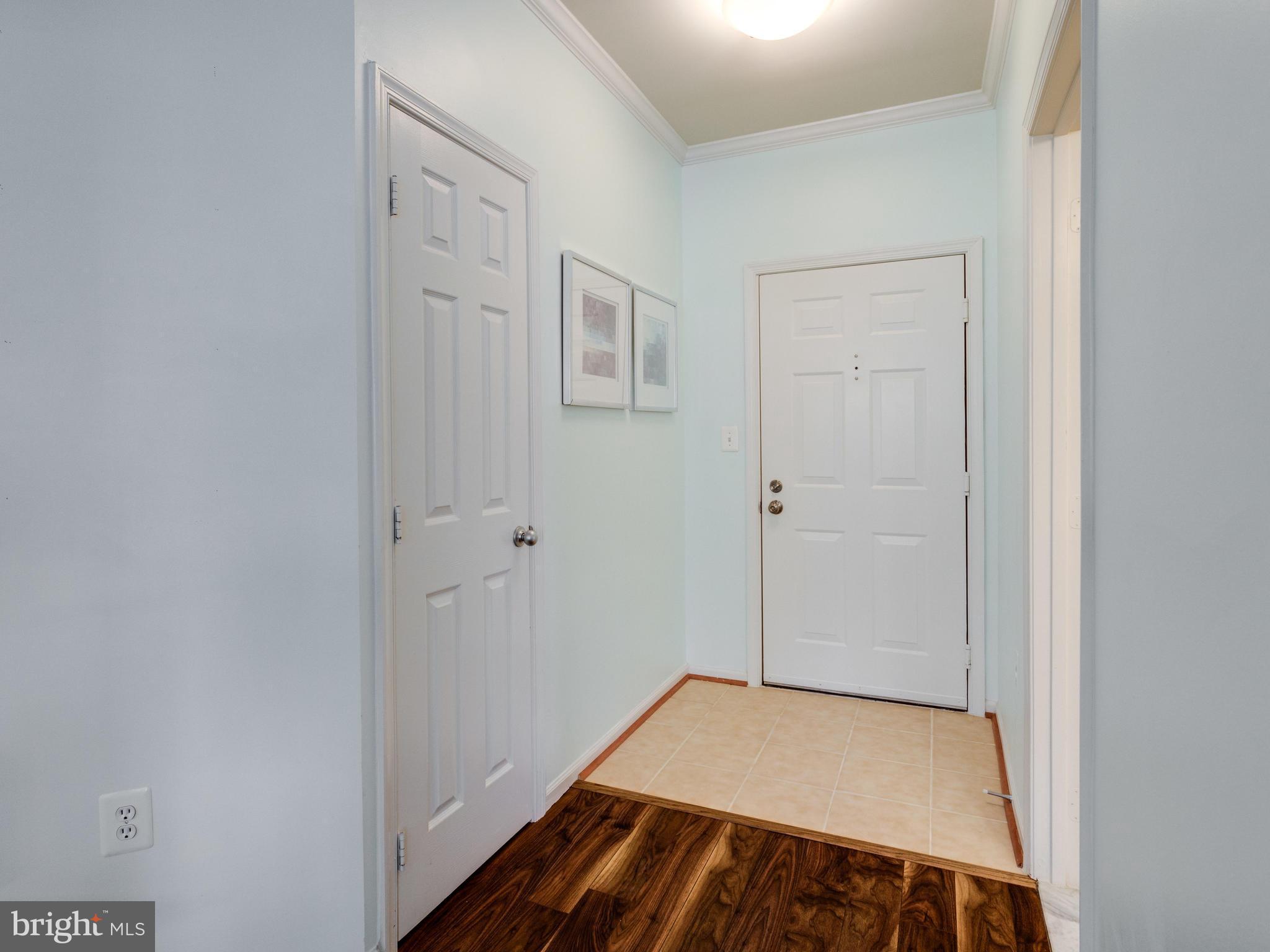 1520 North Point Drive, Unit 201 Reston, VA 20194 - Photo 23 of 30 Entryway w/ closet