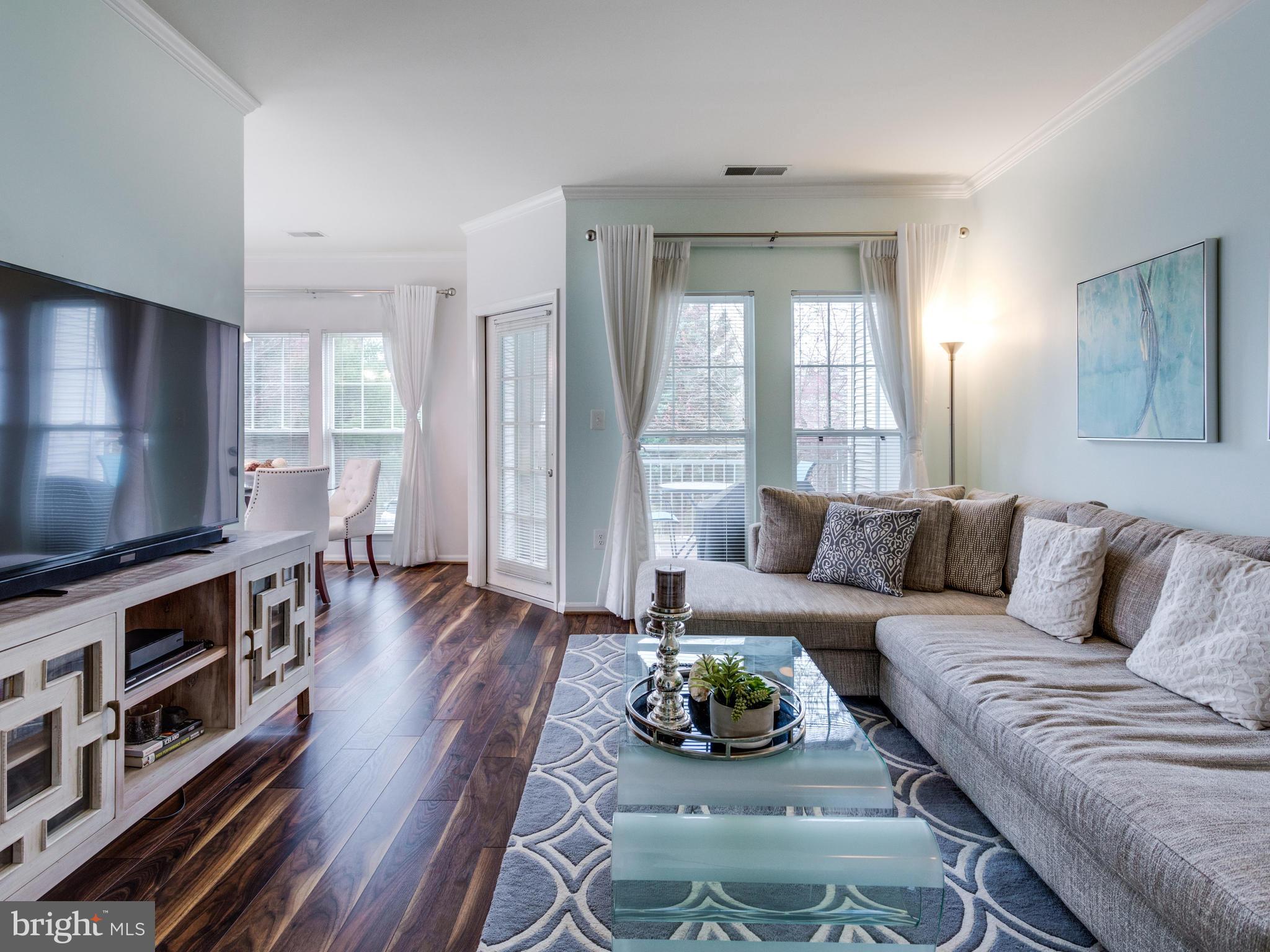 1520 North Point Drive, Unit 201 Reston, VA 20194 - Photo 3 of 30 Inviting space to relax and entertain