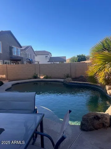 a view of a terrace with sitting area