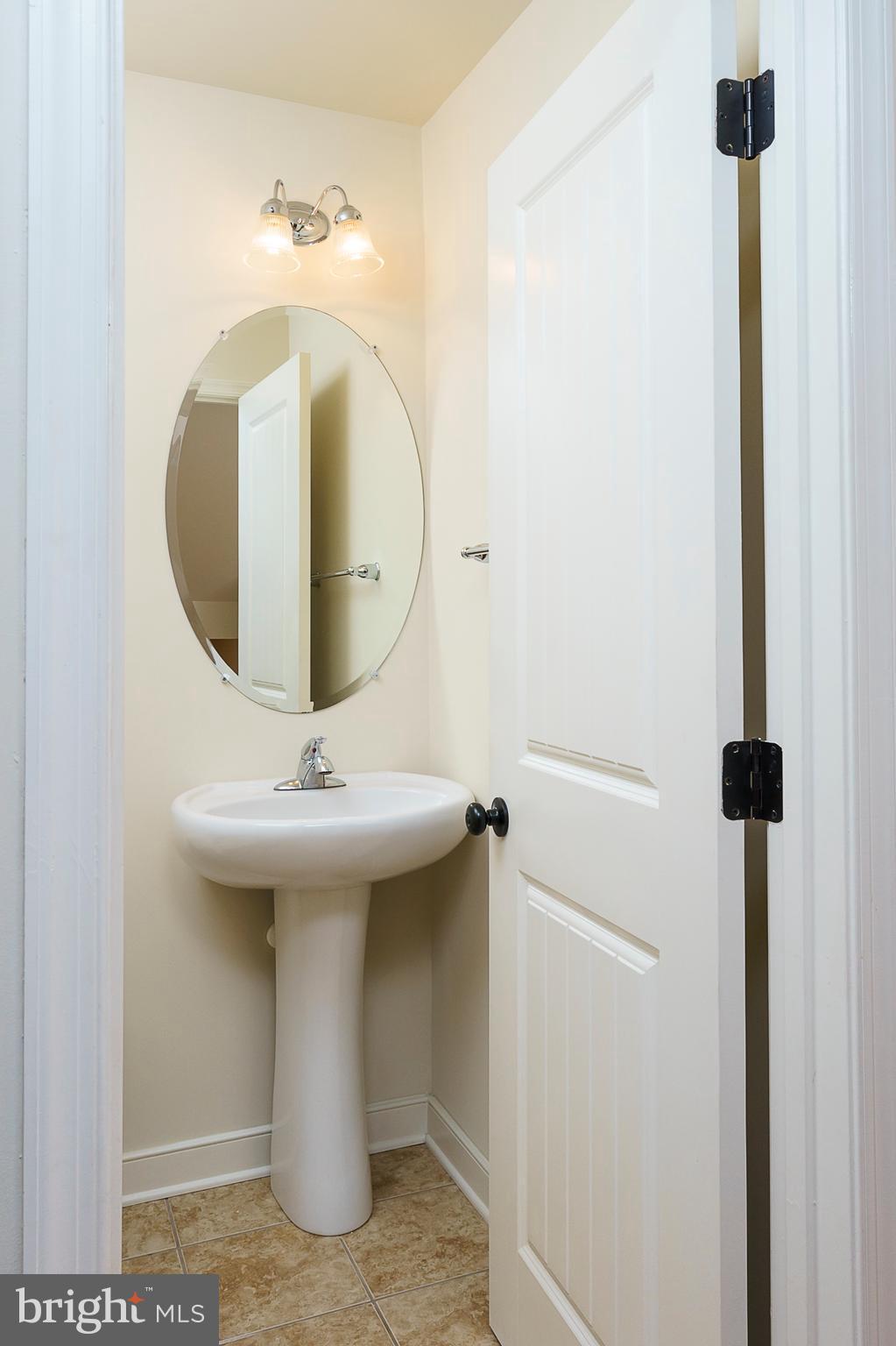 4006 Ward Road Pasadena, MD 21122 - Photo 11 of 28 Half Bathroom