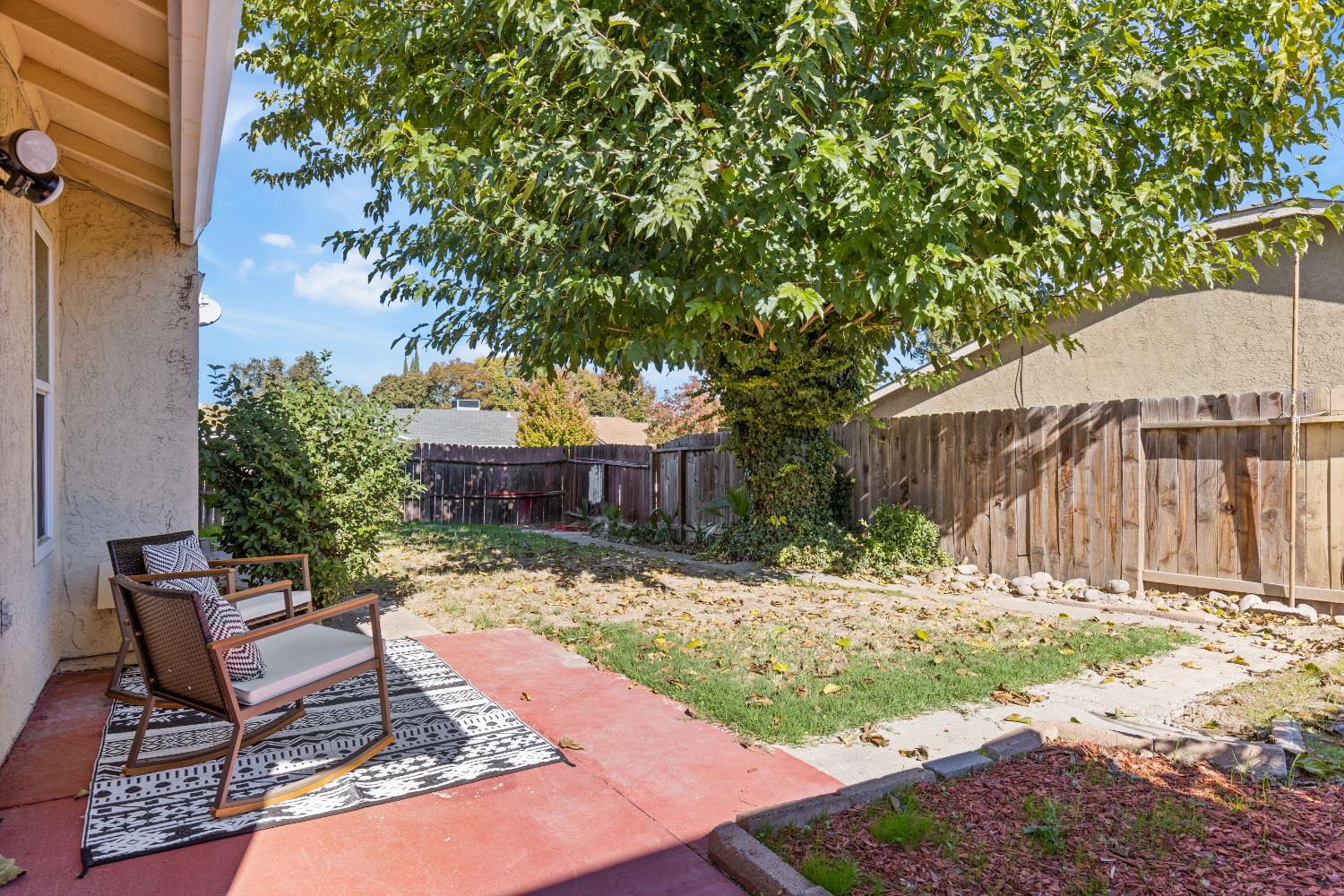 7208 Parkvale Way Citrus Heights, CA 95621 - Photo 16 of 18 a wooden bench sitting in front of a house