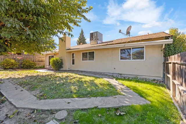 a view of a house with swimming pool