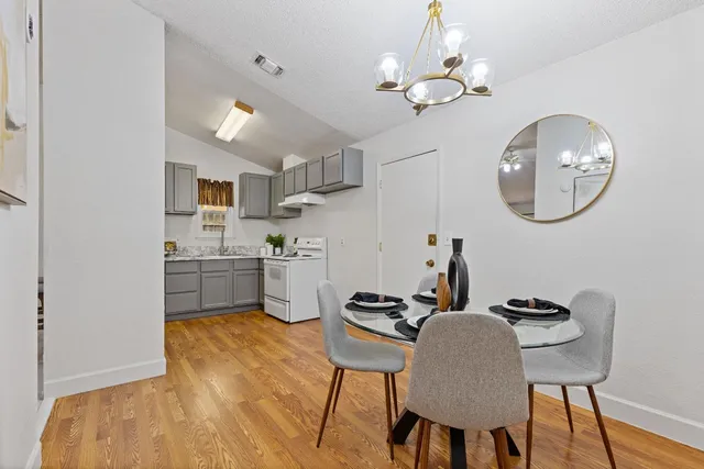 a work room with stove and furniture