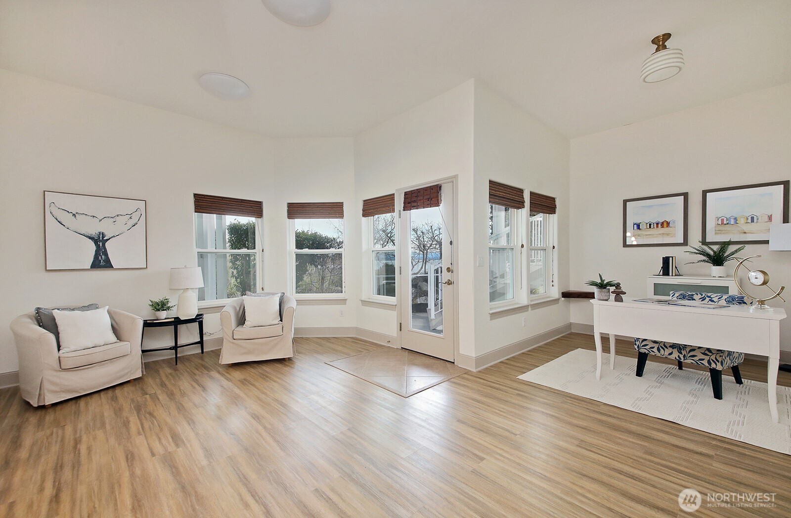 4694 Wrightsman Place Clinton, WA 98236 - Photo 25 of 38 a living room with furniture and wooden floor