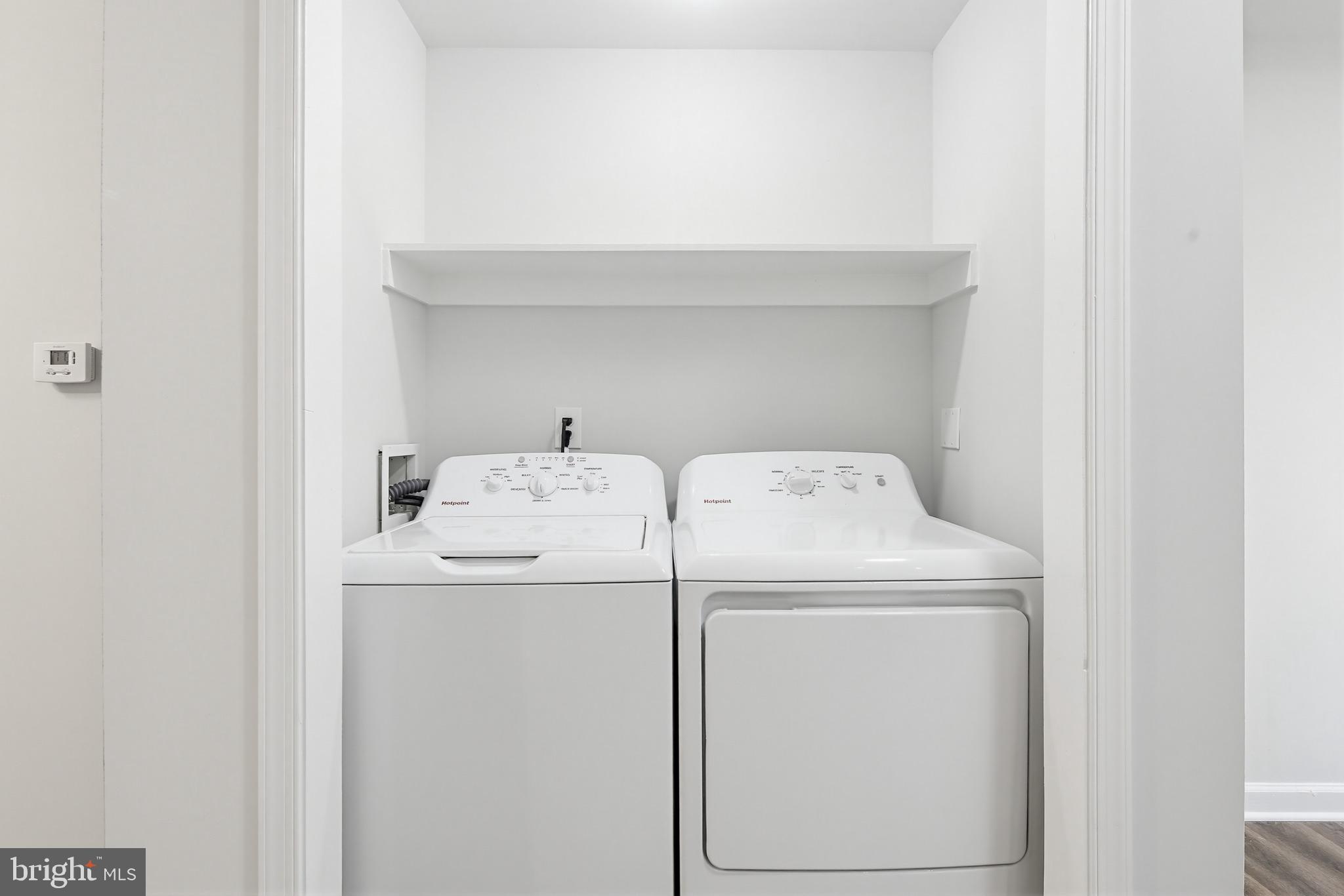 1244 Carroll Street Baltimore, MD 21230 - Photo 28 of 30 a utility room with dryer and washer