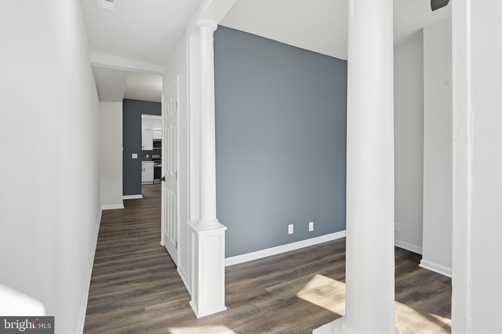 1244 Carroll Street Baltimore, MD 21230 - Photo 30 of 30 a view of a hallway with wooden floor and entryway