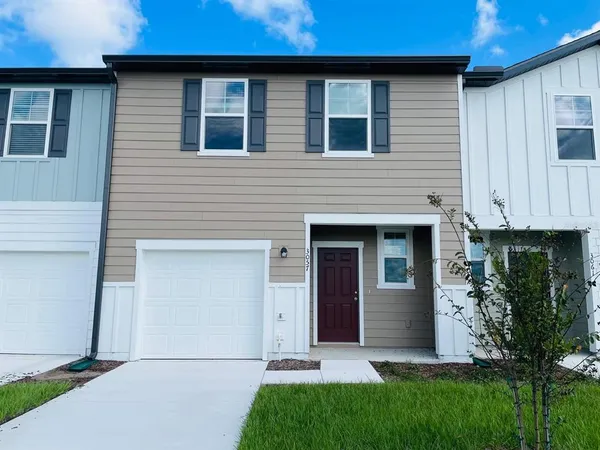 a front view of house with yard