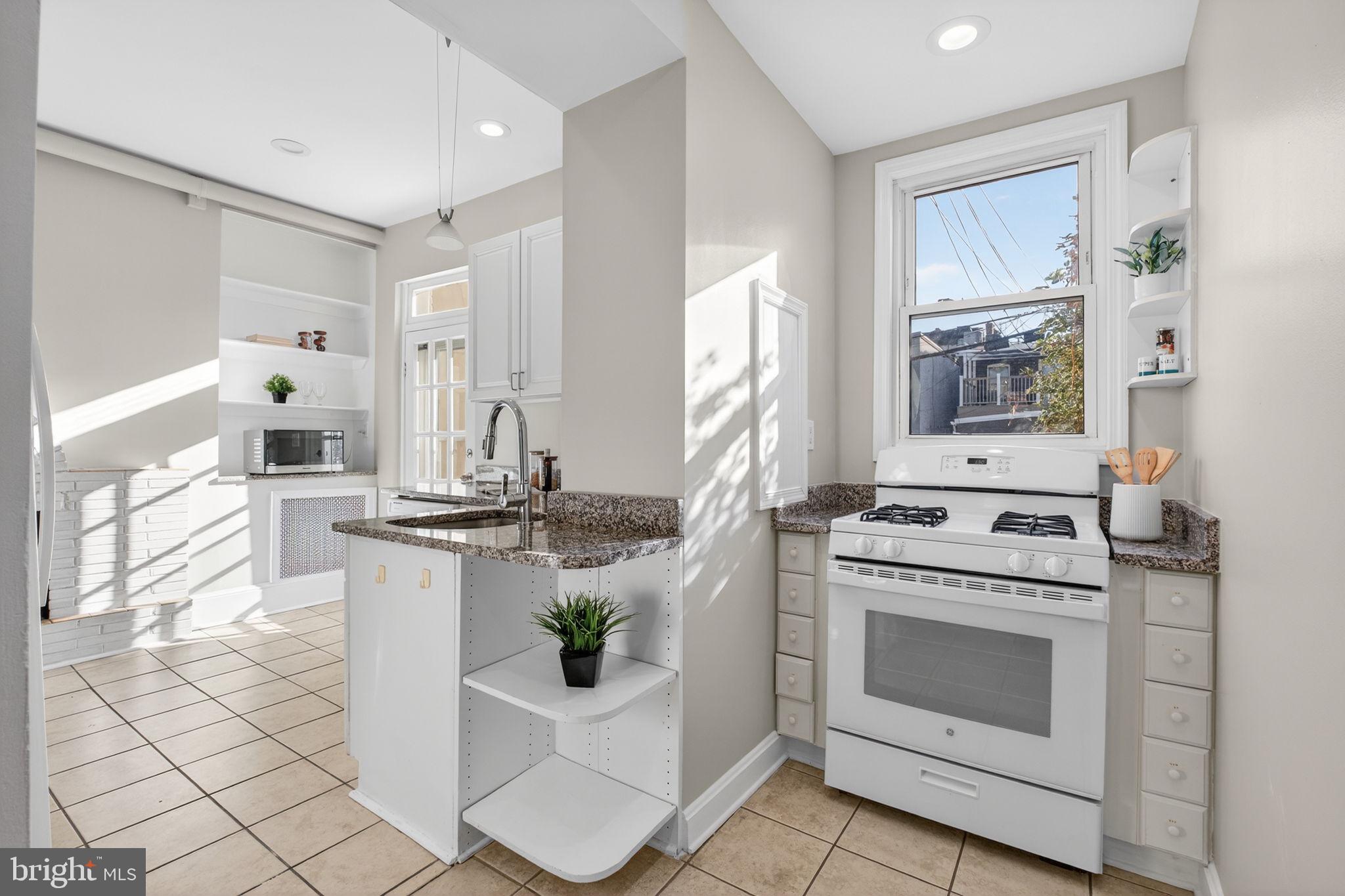 1510 R Street Northwest Washington, DC 20009 - Photo 13 of 113 Kitchen with Upgraded Counter Tops