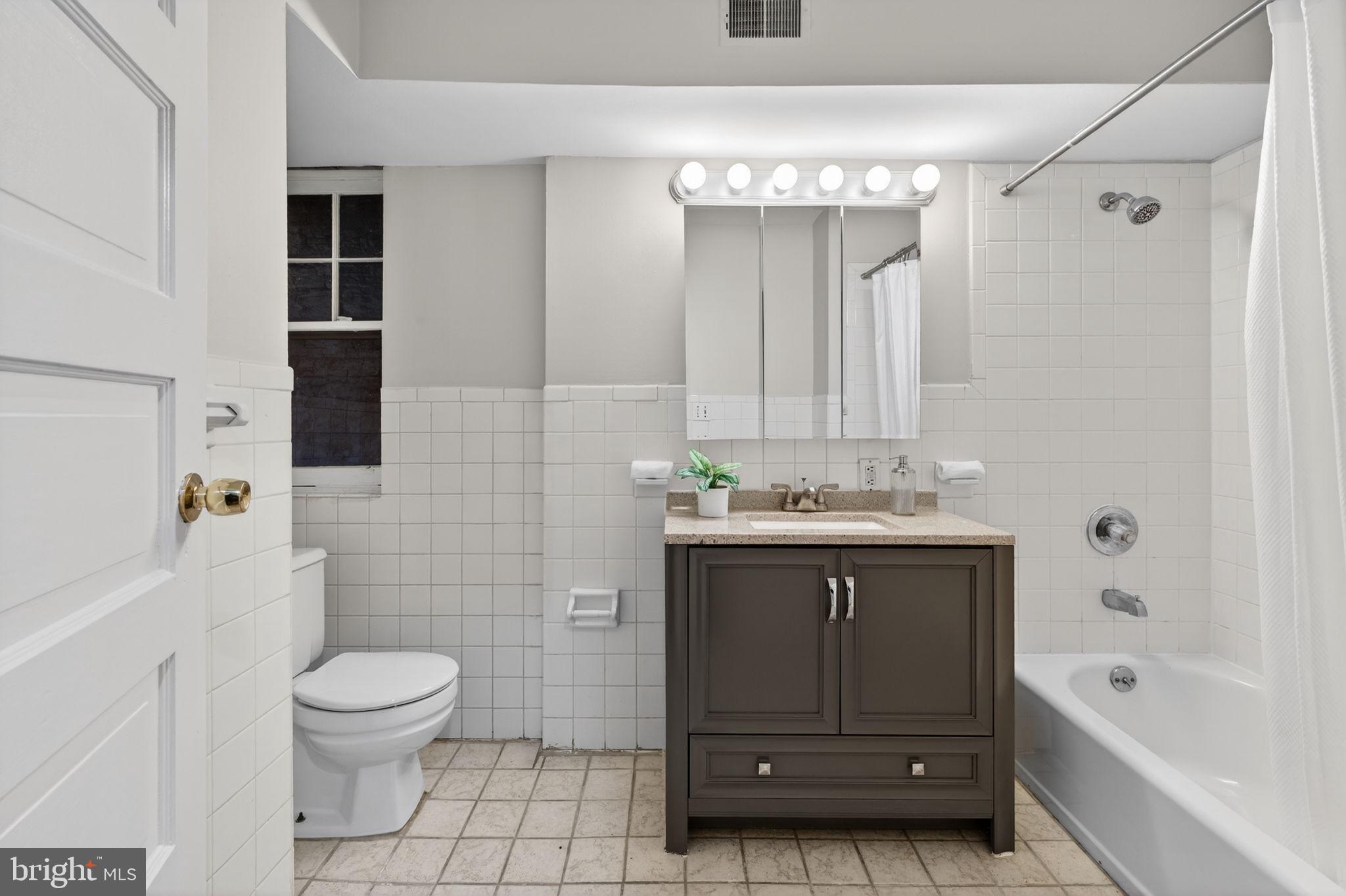 1510 R Street Northwest Washington, DC 20009 - Photo 52 of 113 Full Bath with Updated Vanity