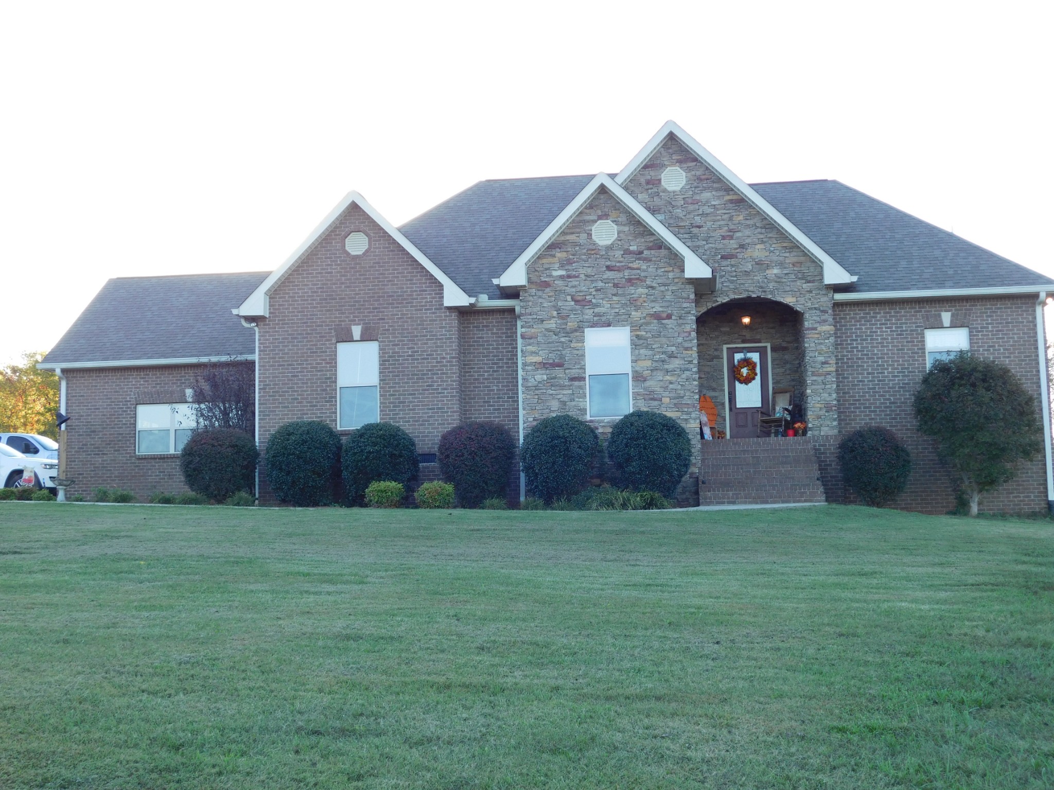 264 Fite Road Watertown, TN 37184 - Photo 1 of 43 a view of a yard in front of a brick house