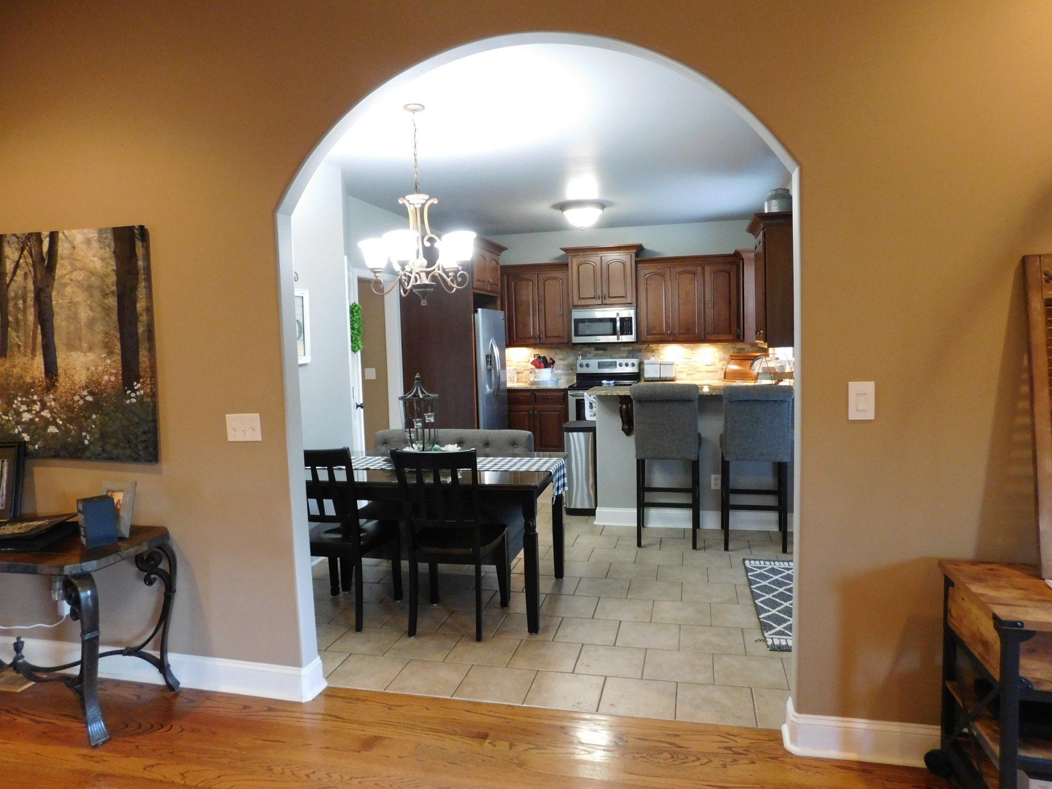 264 Fite Road Watertown, TN 37184 - Photo 21 of 43 a view of a dining room with furniture and wooden floor