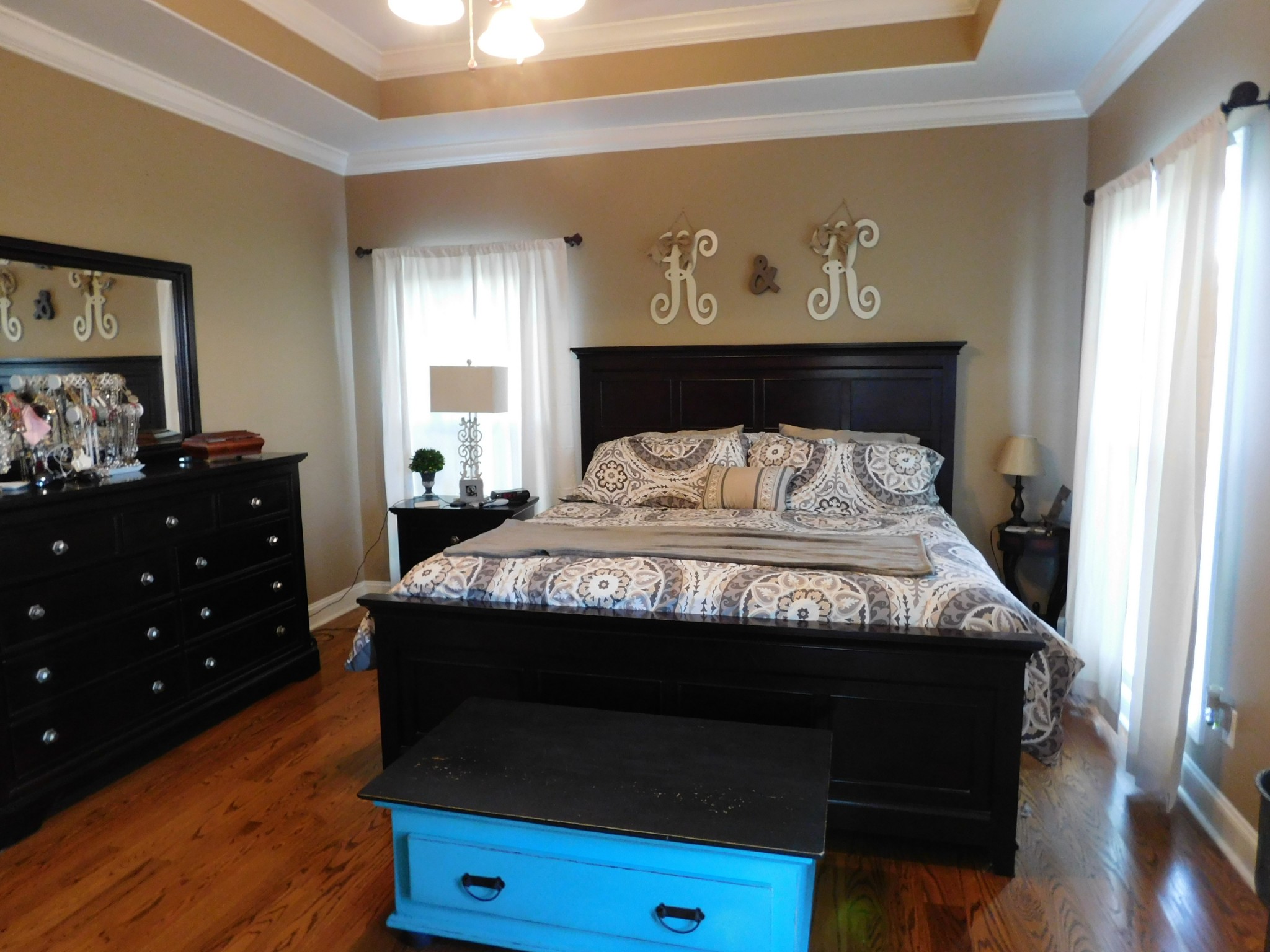 264 Fite Road Watertown, TN 37184 - Photo 30 of 43 a bedroom with a bed and wooden floor