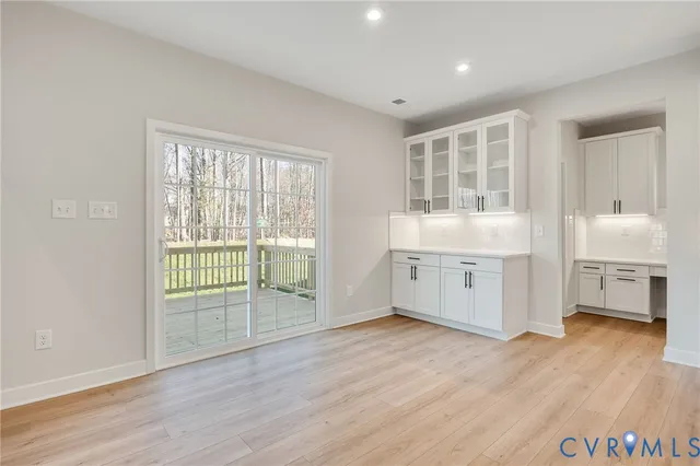 a view of a wooden fence