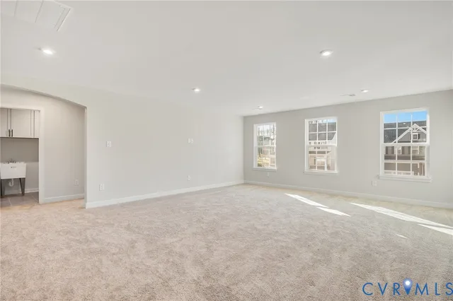 a bathroom with a sink and cabinets