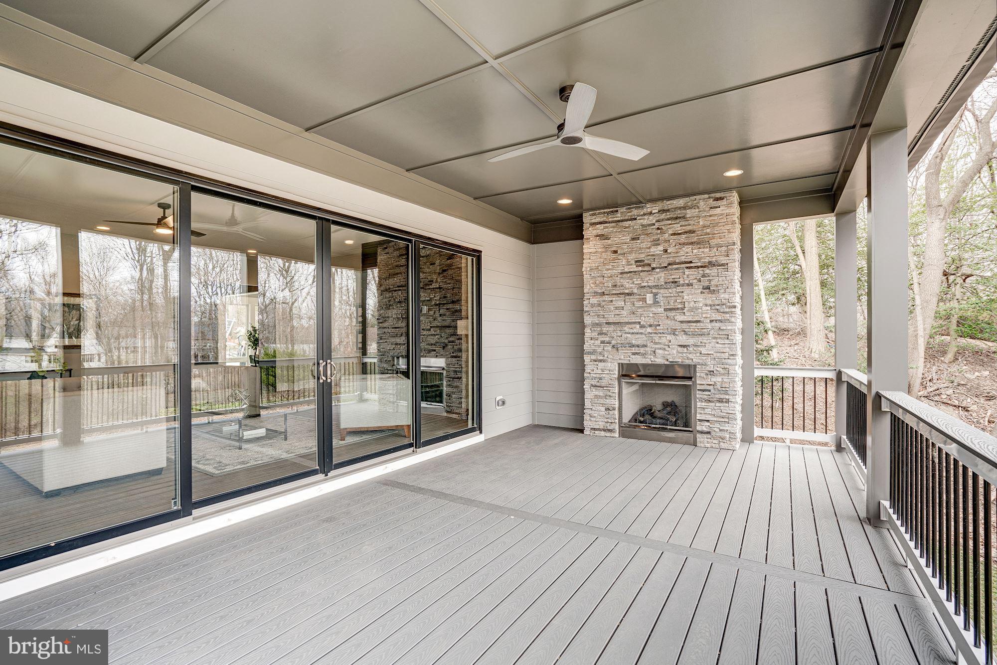 1826 Kirby Road McLean, VA 22101 - Photo 11 of 56 a view of empty room with wooden floor and fireplace