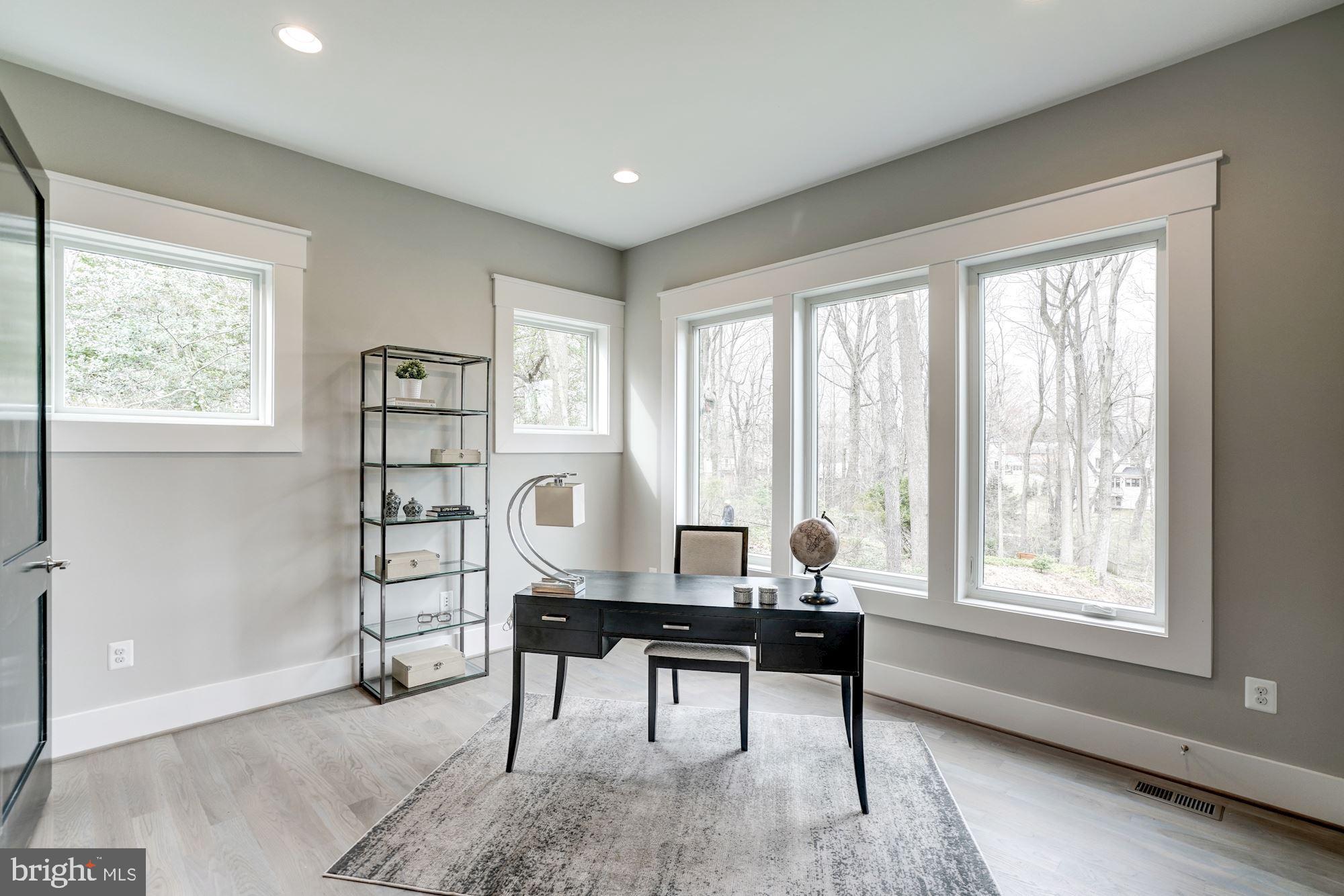 1826 Kirby Road McLean, VA 22101 - Photo 23 of 56 a workspace with furniture and a window