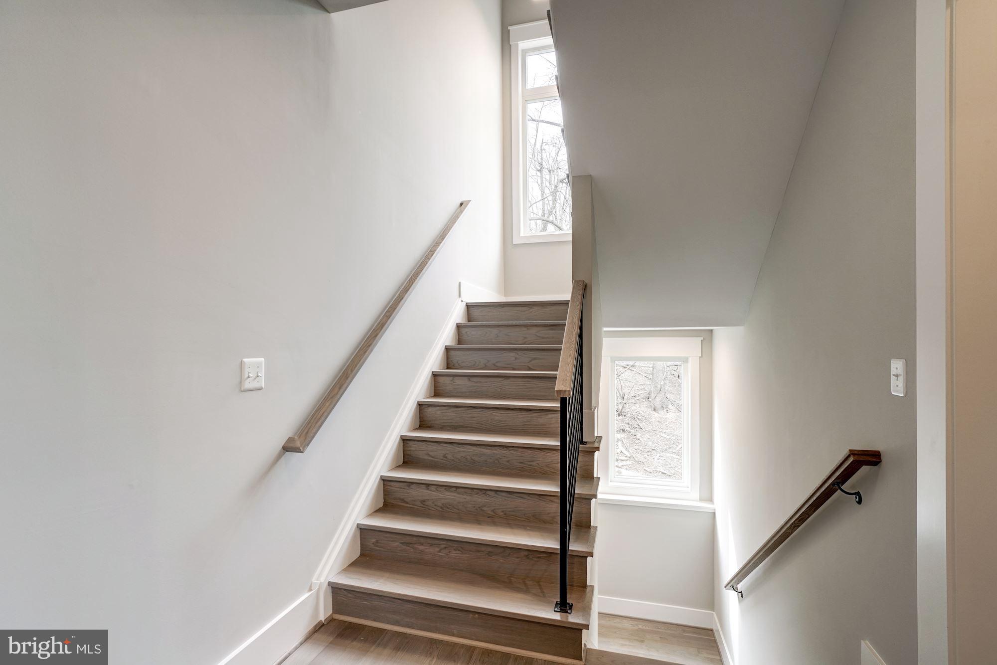1826 Kirby Road McLean, VA 22101 - Photo 25 of 56 a view of entryway with wooden floor and stairs