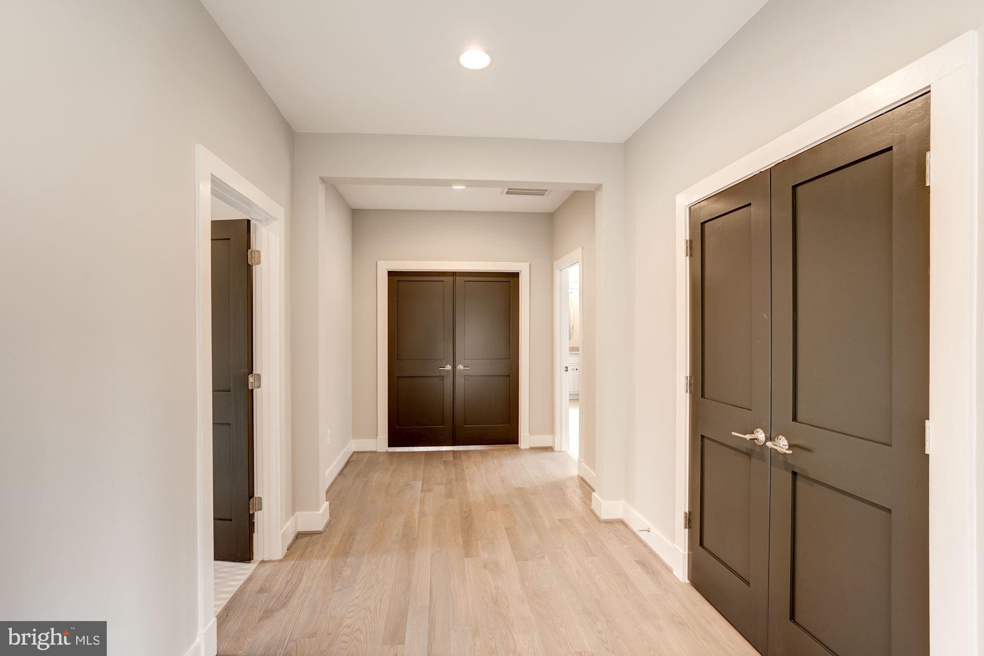 1826 Kirby Road McLean, VA 22101 - Photo 32 of 56 a view of a hallway with wooden floor and closet