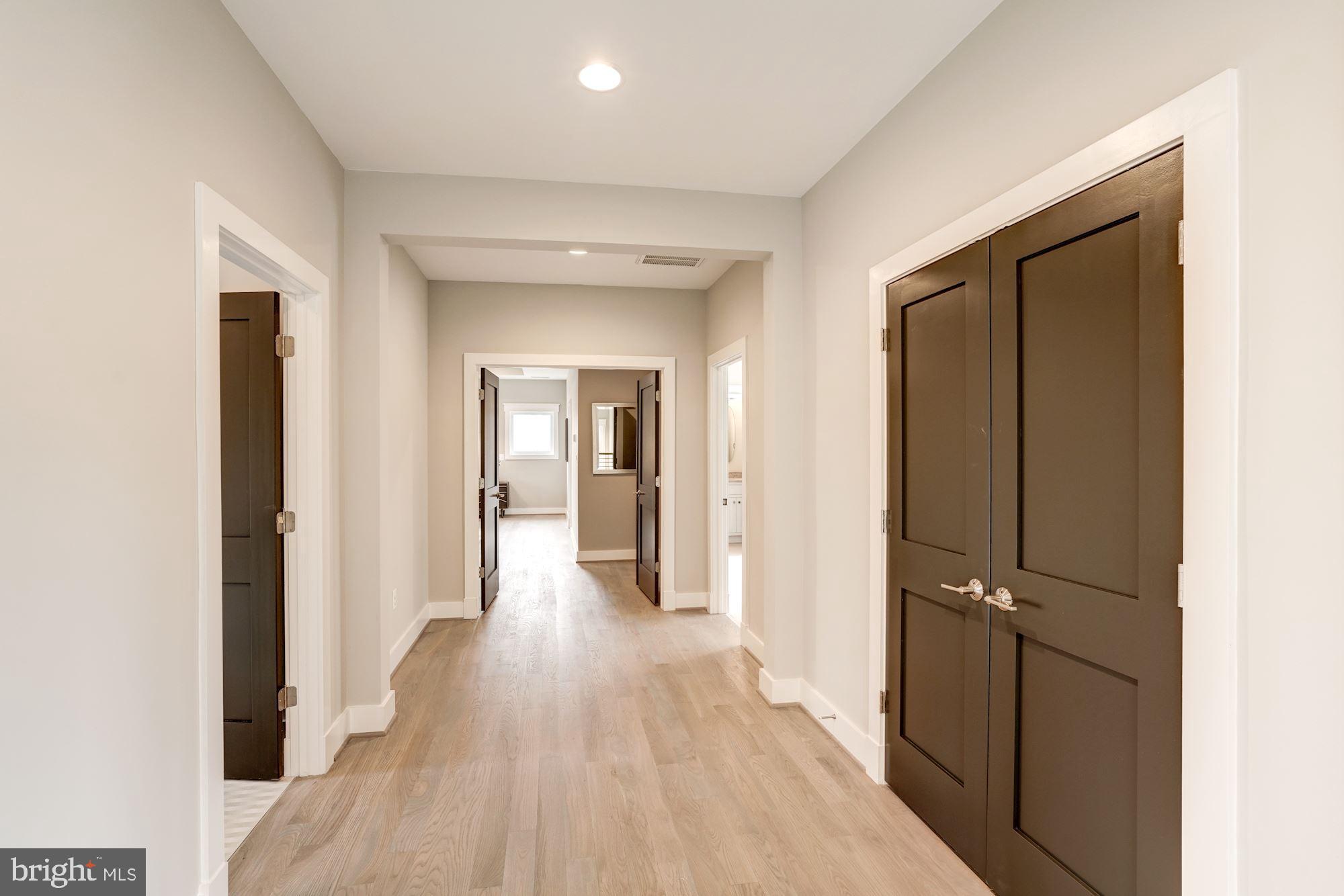 1826 Kirby Road McLean, VA 22101 - Photo 33 of 56 a view of a hallway with wooden floor