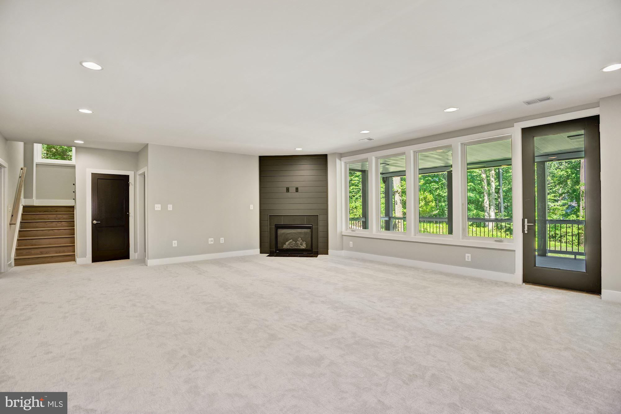 1826 Kirby Road McLean, VA 22101 - Photo 38 of 56 a view of an empty room with a window and a kitchen