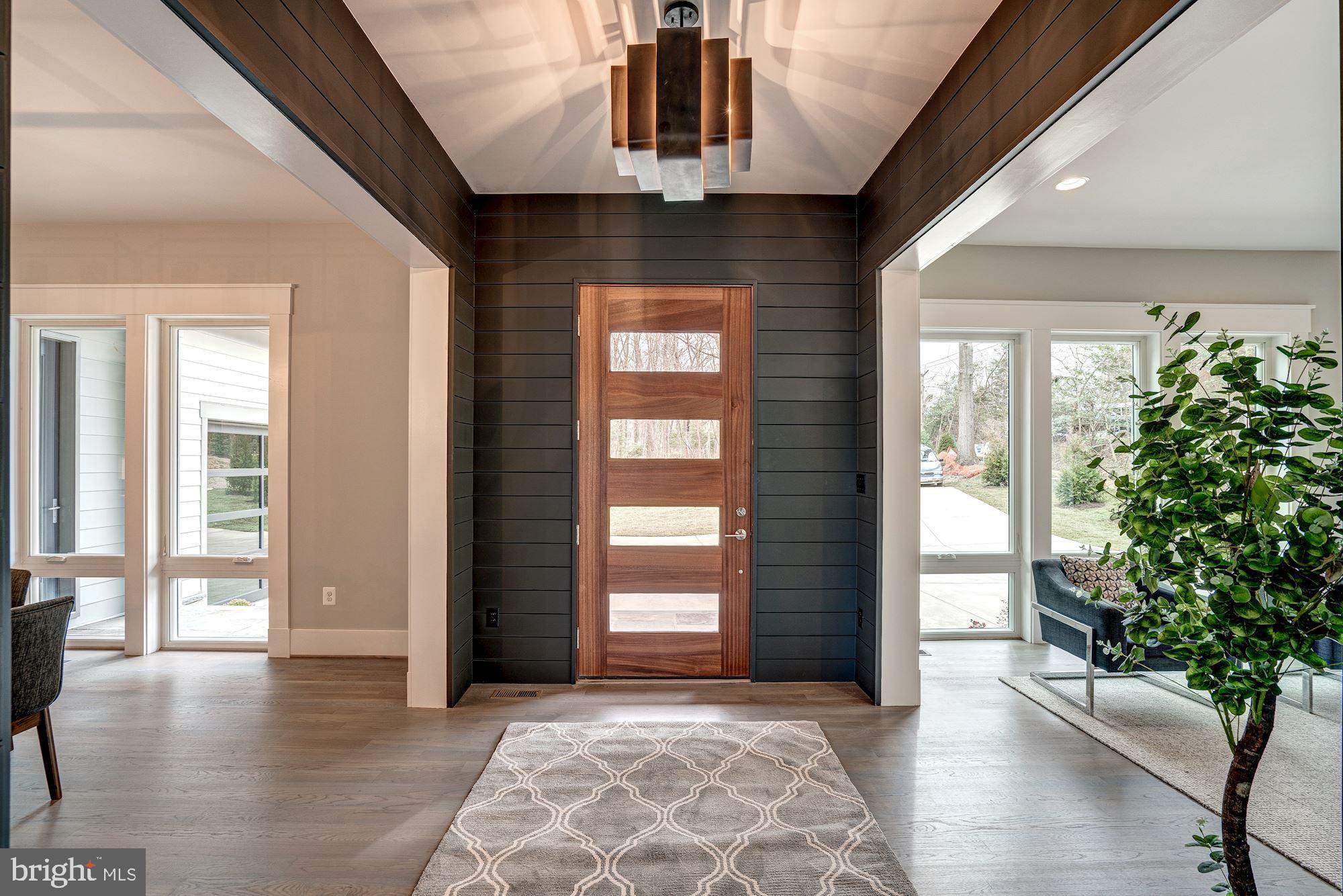 1826 Kirby Road McLean, VA 22101 - Photo 5 of 56 a view of a hallway with windows and stairs