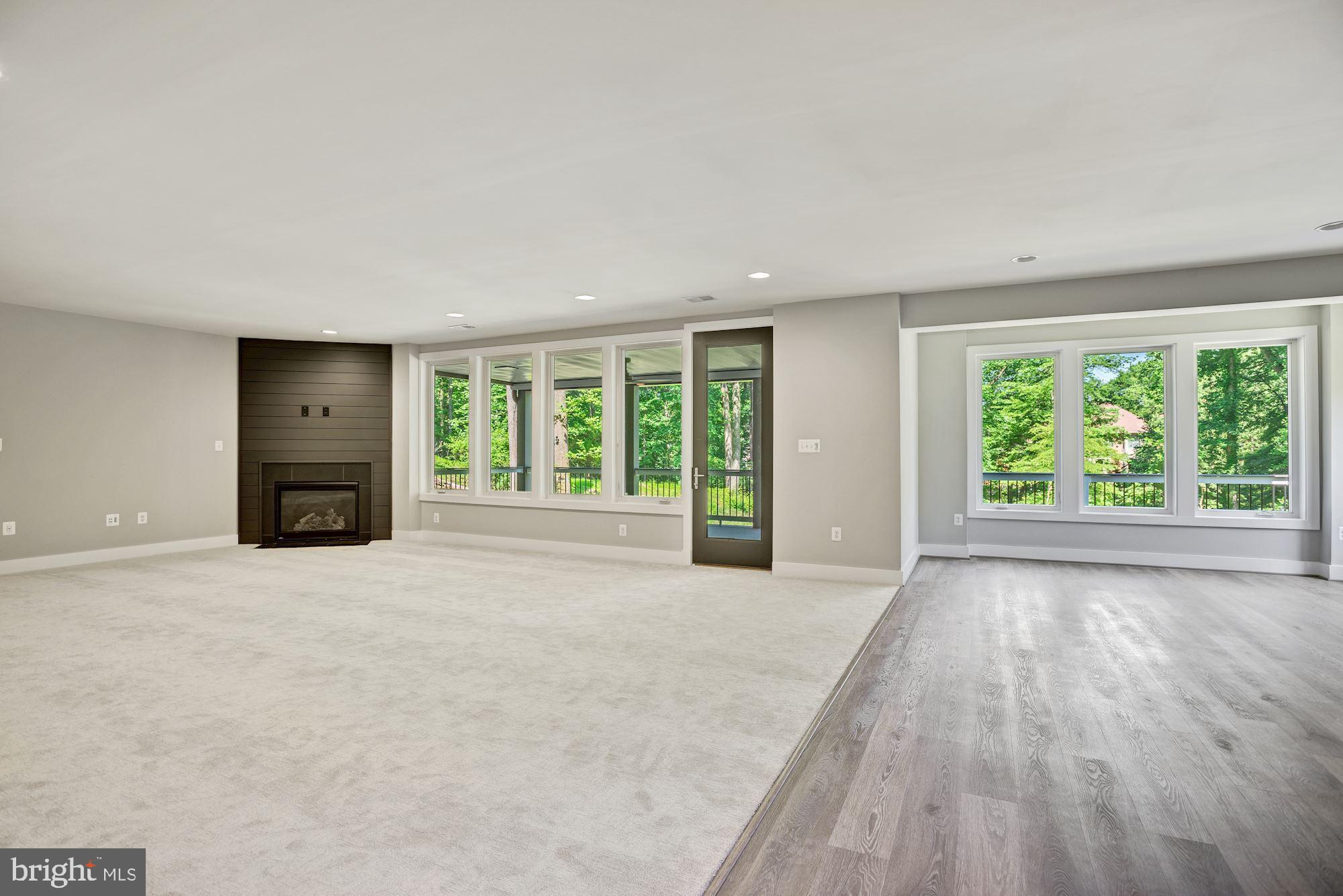 1826 Kirby Road McLean, VA 22101 - Photo 40 of 56 a view of an empty room with a window and a fireplace