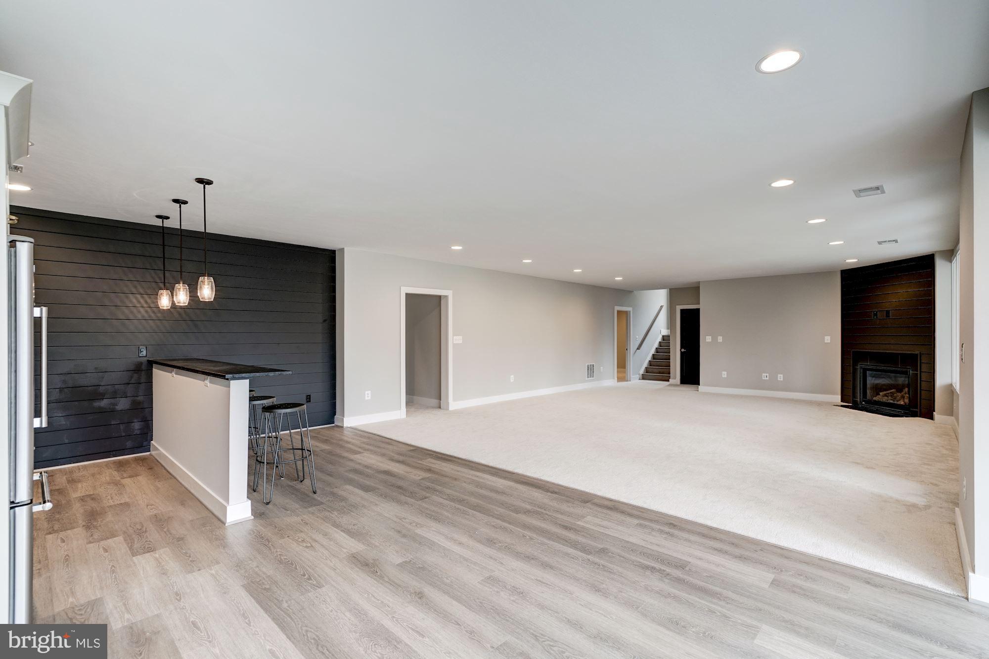 1826 Kirby Road McLean, VA 22101 - Photo 44 of 56 a view of an empty room with kitchen and window