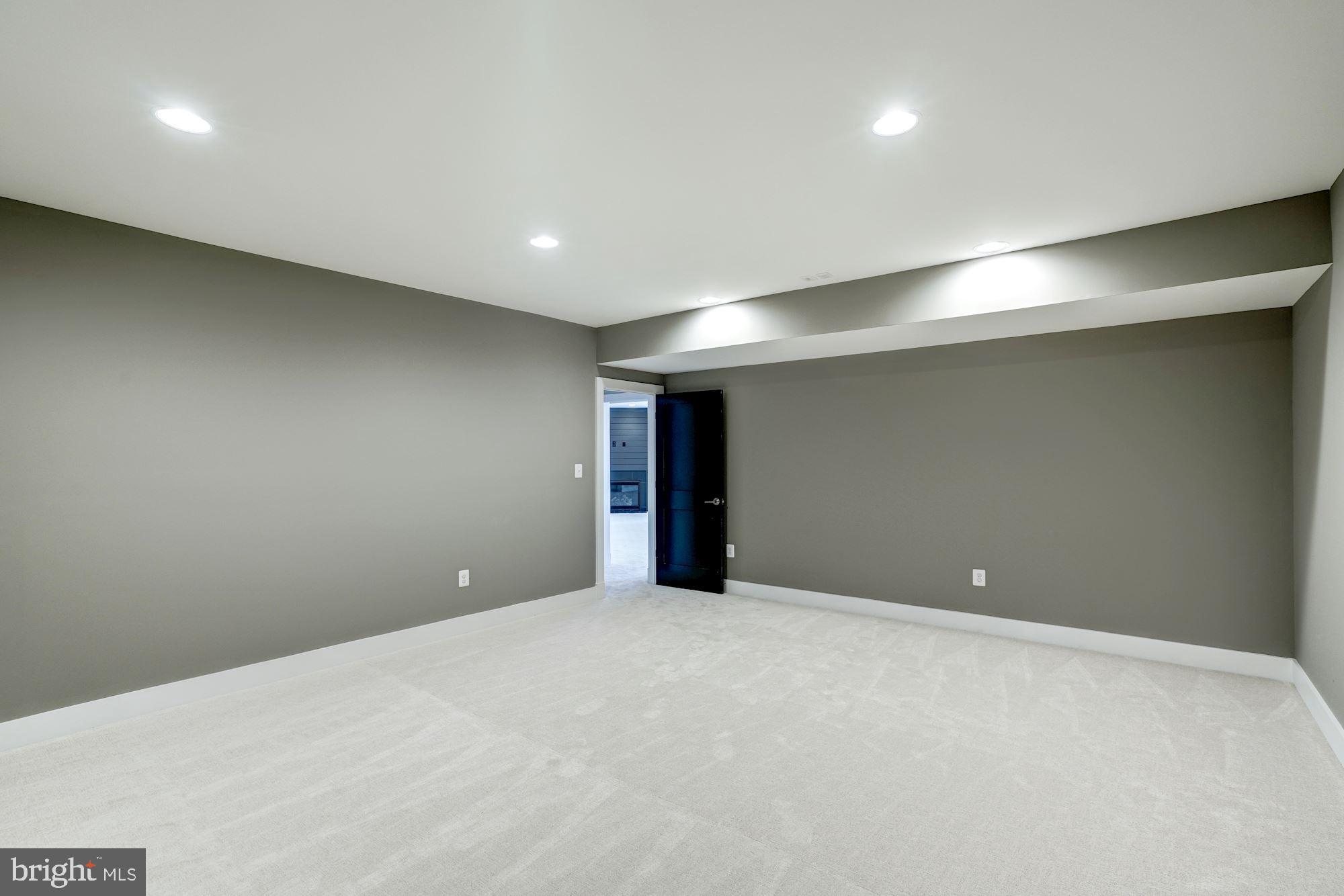 1826 Kirby Road McLean, VA 22101 - Photo 49 of 56 a view of an empty room with wooden floor