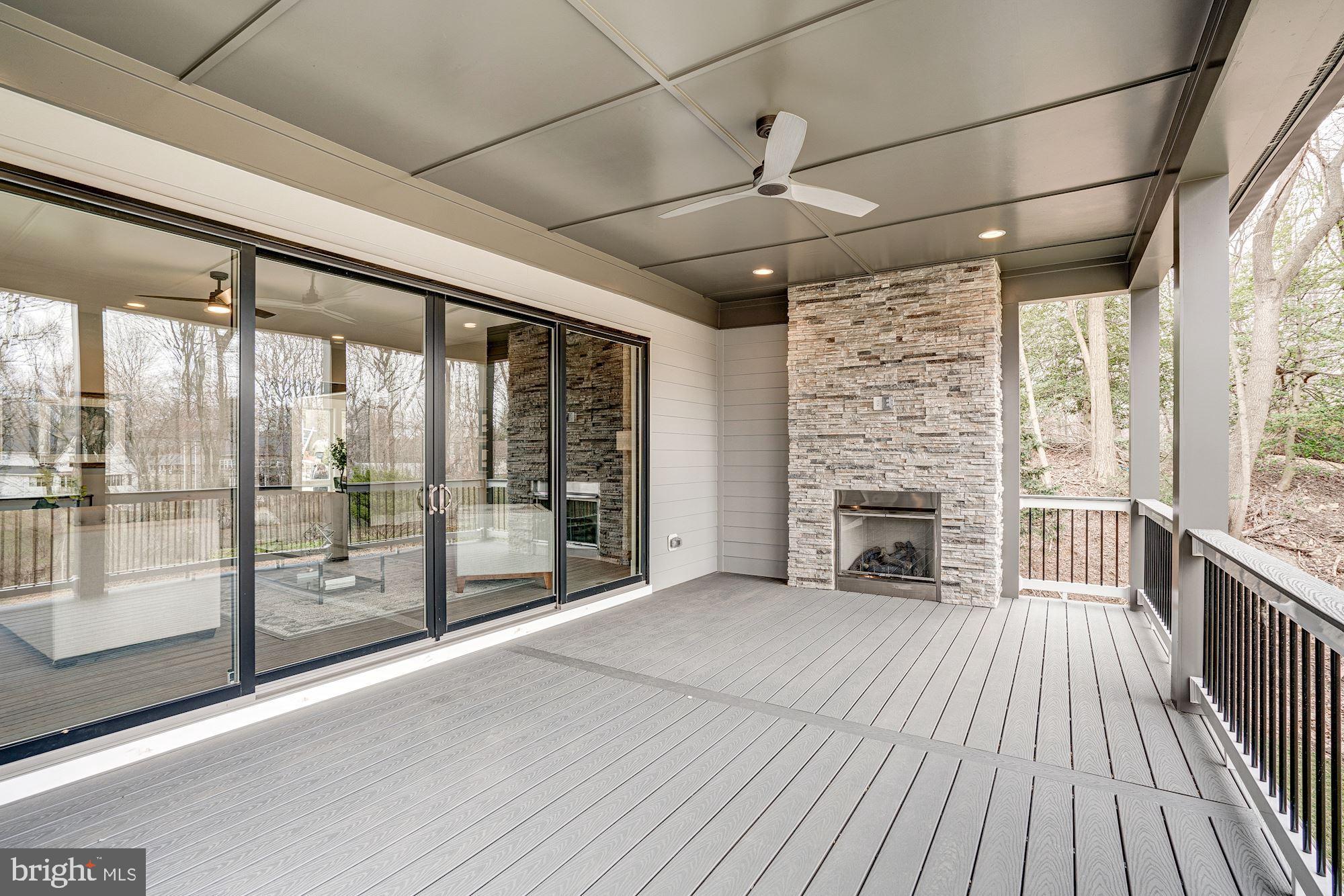 1826 Kirby Road McLean, VA 22101 - Photo 55 of 56 a view of empty room with wooden floor and fireplace