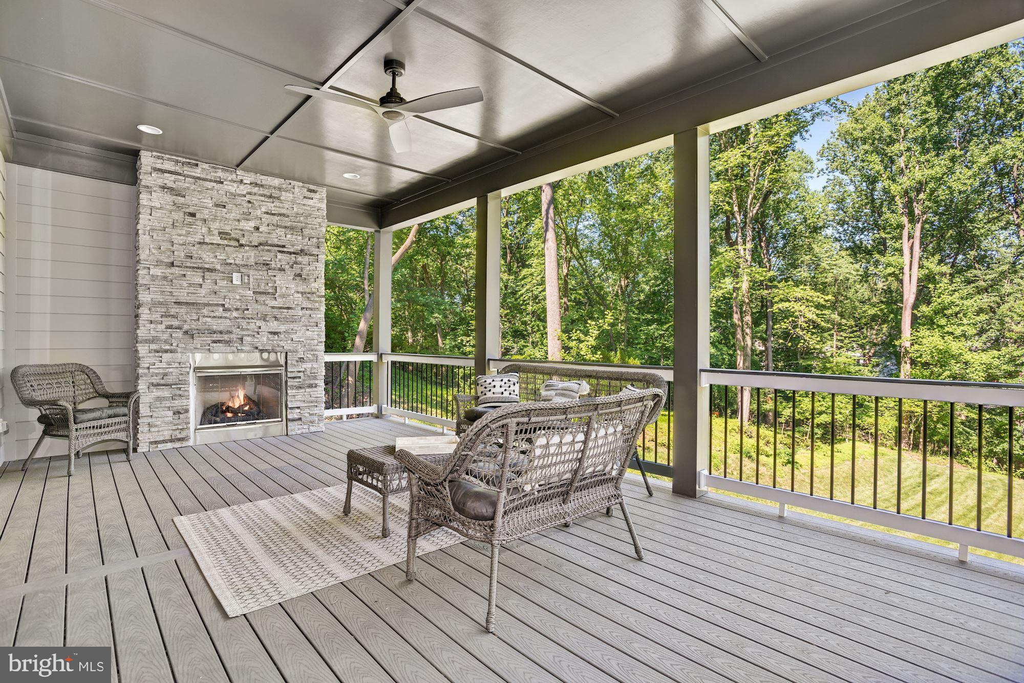 1826 Kirby Road McLean, VA 22101 - Photo 10 of 56 Gas fireplace on porch off of family room
