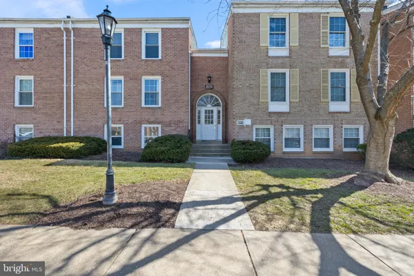 a front view of a house with yard