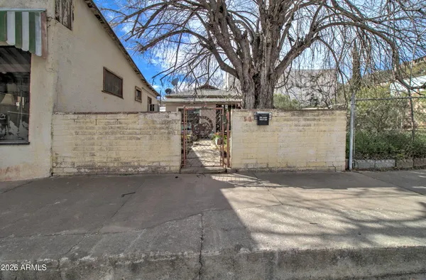 a view of a house with a street