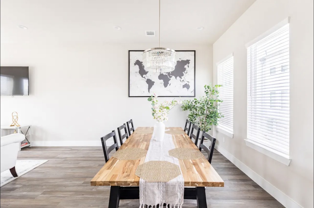 1740 Cove Crescent Houston, TX 77055 - Photo 5 of 44 a view of a dining room with furniture window and wooden floor