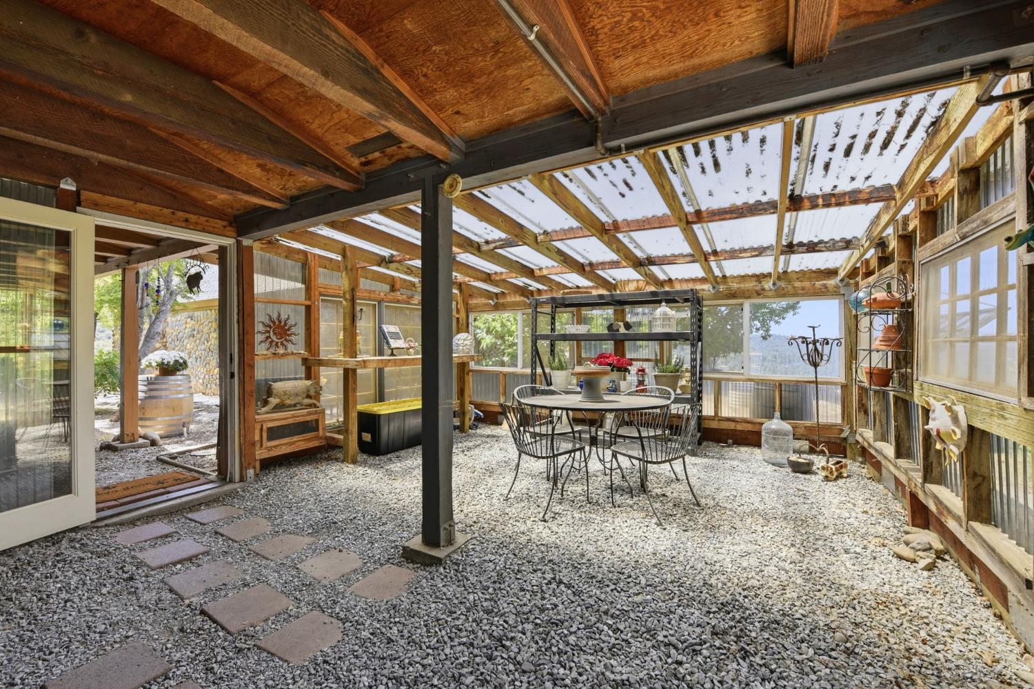 7201 Happy Valley Road Somerset, CA 95684 - Photo 46 of 75 This sunroom is in front of the guest cottage and can also be used as a greenhouse to start your veggies.