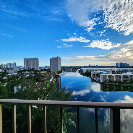 a view of swimming pool from a balcony