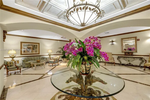 a vase of flowers sitting on a dining table