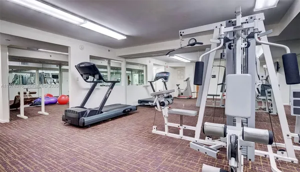 a view of a room with gym equipment