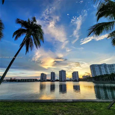 a view of a city with tall buildings